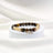 Armband Tigerauge/Rutilquarz mit Elefant