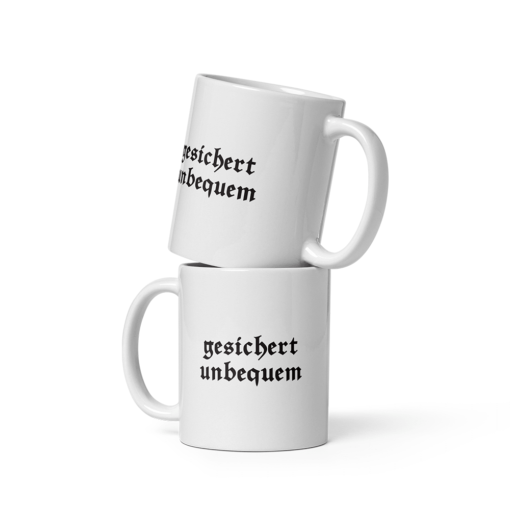 Tasse „Gesichert unbequem“